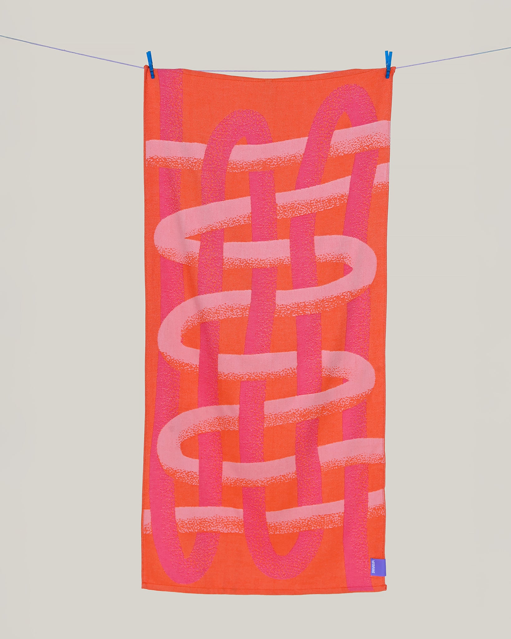 Plażowy ręcznik żakardowy w soczystych kolorach pomarańczu i różu